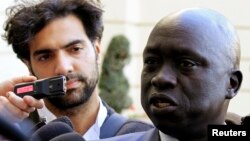 Spokesperson for the South Sudanese rebels Hussein Maar Nyout addresses journalists during ongoing negotiations with the South Sudanese government, in Ethiopia's capital Addis Ababa, Jan. 9, 2014.