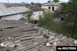 Houses, that locals said were damaged during a recent shelling by Azeri forces, are seen in the town of Martuni in the breakaway Nagorno-Karabakh region, Sept. 28, 2020. (Hayk Baghdasaryan/Photolure via Reuters)