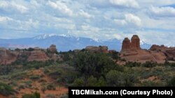 Visitors to Arches National Park in southern Utah look out over an awe-inspiring landscape dotted with more than 2,000 natural stone arches, and hundreds of soaring pinnacles, massive fins and giant balanced rocks.