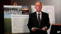A police officer directs traffic at the entrance to the closed ferry terminal in Dover, England, after the Port of Dover was closed and access to the Eurotunnel terminal suspended following the French government's announcement.&nbsp;France banned all travel from the UK for 48 hours from midnight Sunday due to a new coronavirus strain.