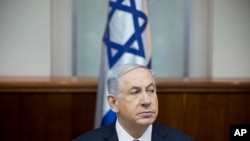 FILE - Israeli Prime Minister Benjamin Netanyahu attends a weekly cabinet meeting in Jerusalem, Jan. 4, 2015.