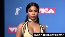 FILE - Nicki Minaj poses in the press room at the MTV Video Music Awards in New York. 