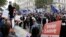 FILE - Brexit supporters form a counterdemonstration as pro-Europe activists protest during a "March for Europe" against the Brexit vote result earlier in the year, in London, Sept. 3, 2016. 