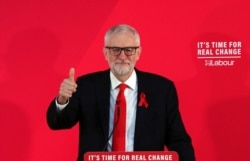 FILE - Britain's opposition Labor Party leader Jeremy Corbyn gestures during a general election campaign event in York, Britain, Dec. 1, 2019.