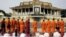 Cambodian Buddhist monks chant, offering prayers in front of the Royal Palace for the late King Norodom Sihanouk in Phnom Penh, Cambodia, Friday, Oct. 19, 2012. The body of Cambodia's late King Sihanouk returned to his homeland Wednesday, welcomed by hundreds of thousands of mourners who packed tree-lined roads in the Southeast Asian nation's capital ahead of the royal funeral. (AP Photo/Heng Sinith)
