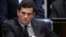 FILE - Brazilian federal judge Sergio Moro reacts during a session at the Federal Senate in Brasilia, Brazil, Dec. 1, 2016.