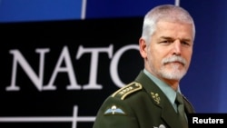 FILE - Chairman of the NATO Military Committee, Czech Army General Petr Pavel, arrives to address a news conference at the Alliance headquarters in Brussels, Belgium, Jan. 18, 2017. 