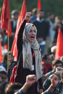 Students shout slogans during a demonstration demanding for reinstatement of student unions, education fee cuts and batter education facilities, in Islamabad on Nov. 29, 2019.