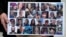 FILE - A photo collage of the 34 victims of the Sept. 2, 2019 fire aboard the dive boat, Conception, at Santa Cruz Island, is held by a family member arriving at federal court in Los Angeles, Oct. 25, 2023. 