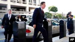 FILE - Paul Manafort arrives at federal court, June 15, 2018, in Washington.