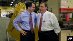 El gobernador de Wisconsin, Scott Walker, y el de Nueva Jersey, Chris Christie, tienen aspiraciones presidenciales.