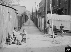 Washington, D.C.'s poor people eked out an existence in the places like De Frees Alley, photographed in 1941. They were underground in the metaphorical, not literal, sense.