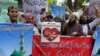 Supporters of a Pakistani religious group chant slogans condemning a suicide bombing in Medina, Saudi Arabia, during a demonstration in Lahore, Pakistan, July 5, 2016.