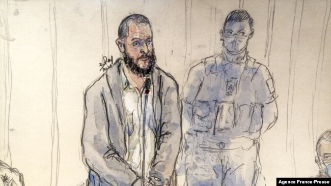 FILE - In this court sketch made Nov. 2, 2021, Salah Abdeslam, left, the prime suspect in the November 13, 2015, Paris attacks, attends the trial taking place in a temporary courtroom set up at the Palais de Justice of Paris.