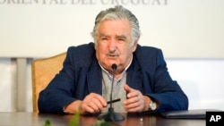 Uruguay's President Jose Mujica speaks during a news conference in Montevideo, Uruguay, Sept. 12, 2014.