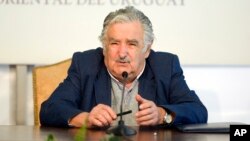 FILE - Uruguay's President Jose Mujica speaks during a news conference at the presidential house Residencia de Suarez y Reyes, in Montevideo, Uruguay, Sept. 12, 2014.