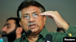 Pakistan's former President Pervez Musharraf speaks during a news conference in Dubai, March 23, 2013.