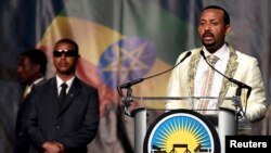 Ethiopia’s prime minister, Abiy Ahmed, addresses his country’s Washington-based diaspora, the largest outside Ethiopia, calling on them to return to, invest in and support their native land with the theme “Break the Wall, Build a Bridge,” in Washington, July 28, 2018.