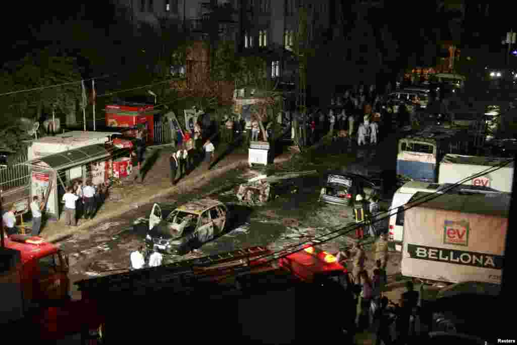 Officials work at the scene of an explosion in the southeastern Turkish town of Gaziantep, August 20, 2012.