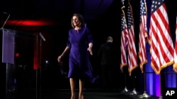 House Democratic Leader Nancy Pelosi arrives to speak to a crowd of volunteers and supporters of the Democratic party at an election night event at the Hyatt Regency Hotel, on Tuesday, Nov. 6, 2018, in Washington.