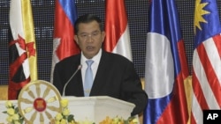 Cambodian Prime Minister Hun Sen speaks at the opening of the 45th Association of Southeast Asian Nations Foreign Ministers' Meeting in Phnom Penh, Cambodia, July 9, 2012.