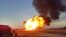 FILE - Flames rise from a gas line explosion outside Damascus, Syria, Aug. 24, 2020. ISIS on Sept. 18, 2021, claimed responsibility for an attack on a gas pipeline southeast of the Syrian capital that led to power outages in and around the city.