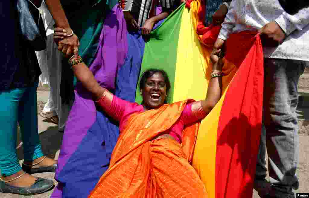 An activist of lesbian, gay, bisexual and transgender (LGBT) community celebrates after the Supreme Court's verdict of decriminalizing gay sex and revocation of the Section 377 law, in Bengaluru, India.