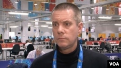 Jack Gallagher, Olympic Press Center, Olympic Village, Sochi, Russia, Feb. 16, 2014. (Parke Brewer/VOA)