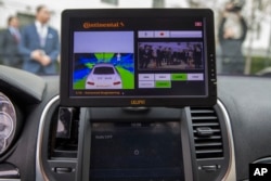 A display inside a Tesla Model 90D during a demonstration of car technology on Capitol Hill in Washington, March 15, 2016.