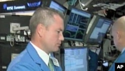 A trader at the New York Stock Exchange