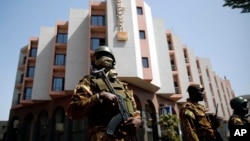 FILE - Tight security surrounds the Radisson Blu hotel after al-Qaida launched a deadly attack on guests in Bamako, Mali, Nov. 20, 2015.
