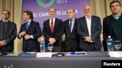 Candidatos presidenciales para las elecciones del 27 de octubre de 2019 en Uruguay. De izquieda a derecha, Guido Manini Ríos, Luis Lacalle Pou, Pablo Mieres, Daniel Martínez, Edgardo Novick y Ernesto Talvi.