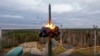 FILE - In an image from video released by Russian Defense Ministry Press Service on Oct. 26, 2022, a Yars intercontinental ballistic missile is test-fired as part of Russia's nuclear drills from a launch site in Plesetsk, northwestern Russia. 