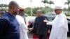 President of Nigeria Muhammadu Buhari (R) greets former President of Ghana John Mahama (2nd R) in Abuja on Jan. 9, 2017.