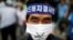 FILE - A Seoungju resident takes part in a protest against the government's decision on deploying a U.S. THAAD anti-missile defense unit in Seongju, in Seoul, South Korea, July 21, 2016. 