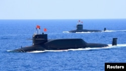 一艘中國094改進型戰略導彈核潛艇2018年4月12日在南中國海參加演習。