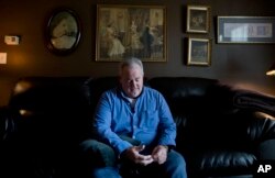 Kyle Graves, who is in recovery for opioid addition, sits in the home he shares with his mother in Franklin, Tennessee, June 6, 2017.