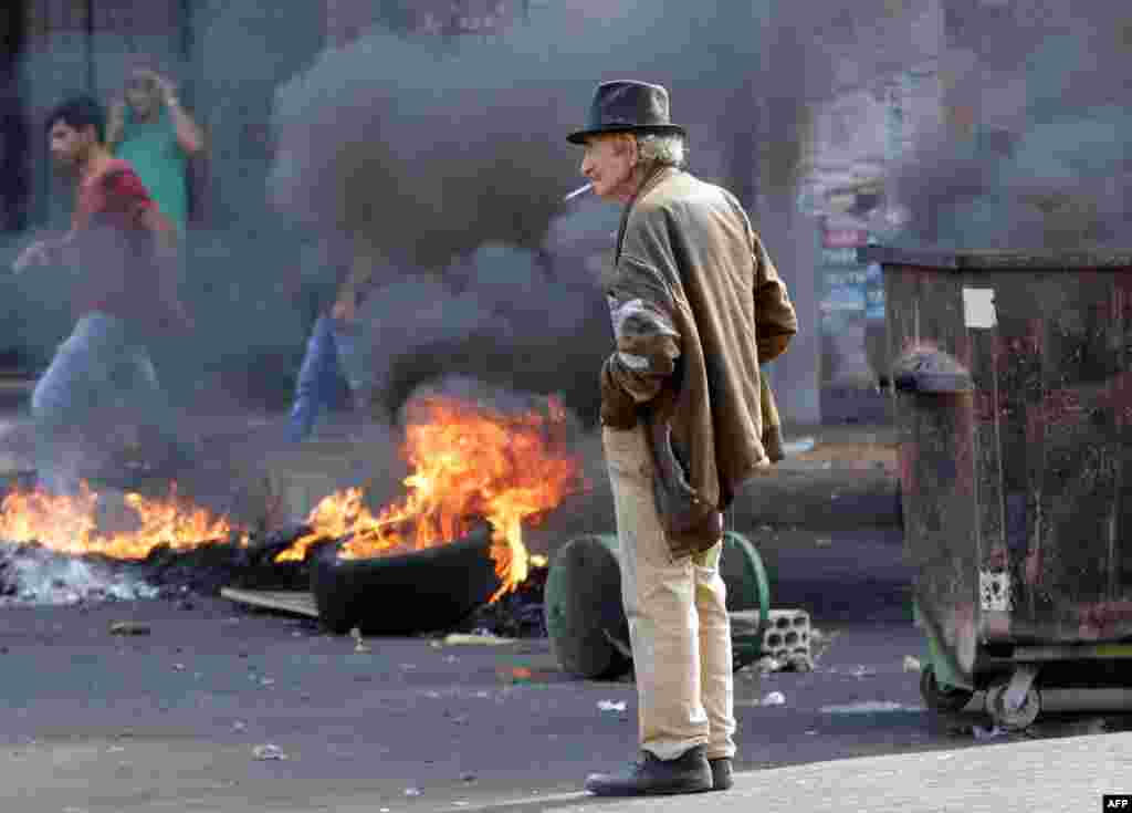 Lebanese demonstrators burn tires during a protest against poor economic conditions in the northern port city of Tripoli.