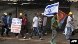 Eritreans demonstrate against new deportation regulations in Tel Aviv, Israel, on June 29, 2012.