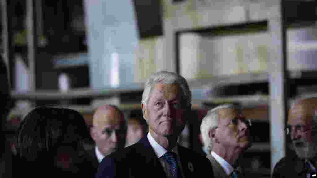 Former U.S. President Bill Clinton tours the former battery factory at Potocari memorial complex marking 20th anniversary of the Srebrenica massacre of Potocari, 150 kilometers northeast of Sarajevo, July 11, 2015. 