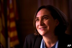 Barcelona's mayor Ada Colau speaks during an interview with The Associated Press at the city council in Barcelona, Spain, Sept. 28, 2017.