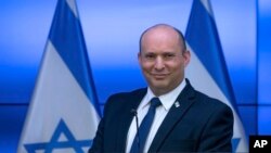 Israeli Prime Minister Naftali Bennett holds a news conference at the Government Press Office in, Jerusalem, Nov. 6, 2021.