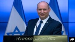 Israeli Prime Minister Naftali Bennett holds a news conference at the Government Press Office in, Jerusalem, Nov. 6, 2021. Bennett said there was no room in Jerusalem for another American mission.