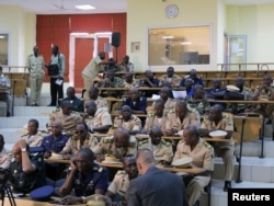 Military experts take part in a meeting to discuss the Mali crisis in Bamako, October 30, 2012.