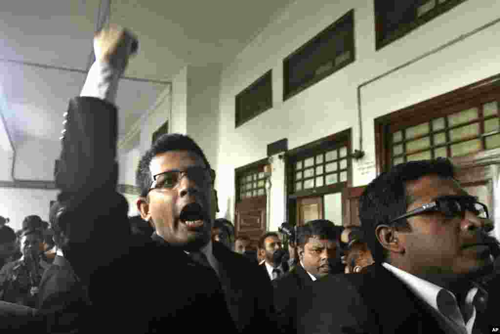 Lawyers of the main opposition Bangladesh Nationalist Party protest after the Supreme Court cleared the way for the execution of Abdul Quader Mollah, an opposition leader convicted of war crimes in Dhaka, Dec. 12, 2013.