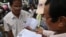 Opposition supporters check and count thumbprints on a petition to King Norodom Sihamoni at Cambodia National Rescue Party's headquarters in Phnom Penh, June 2, 2016.