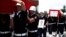 Turkish police officers carry the coffin of slain police officers Serdar Kazar and Isa Ipek, killed in an attack by Kurdish rebels overnight, in the the city of Adana, southern Turkey, July 31, 2015.