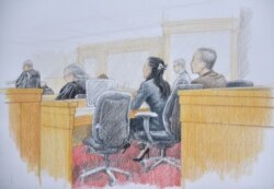 Huawei chief financial officer Meng Wanzhou attends her extradition hearing in British Columbia Supreme Court in Vancouver, British Columbia, Jan. 21, 2020, in this courtroom sketch by Jane Wolsak.