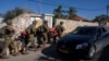 Israeli soldiers patrol the perimeter of the agricultural settlement of Avivim, next to the Lebanese border, in upper Galilee, Israel, Dec. 2, 2024.