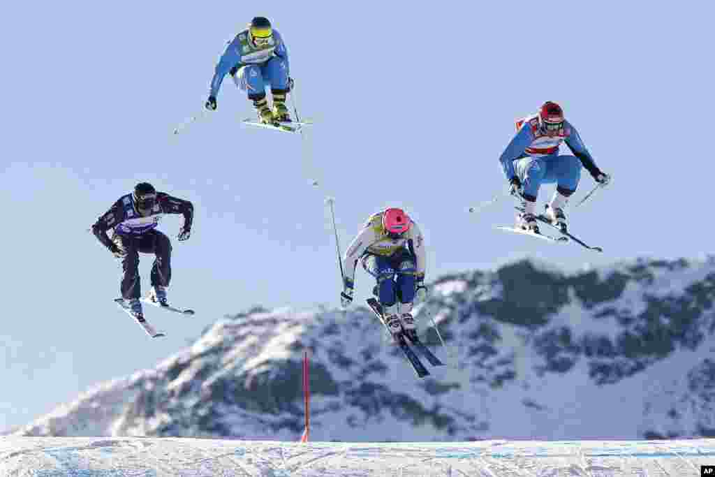 Andreas Matt of Austria, right, performs on his way to win the final of the men&#39;s ski cross World Cup event in Val Thorens, French Alps, ahead of Victor Oehling Norberg of Sweden, second right, who finished second, Jean Frederic Chapuis of France, left, who finished third, and Franz Promok of Austria, second right, who finished fourth.